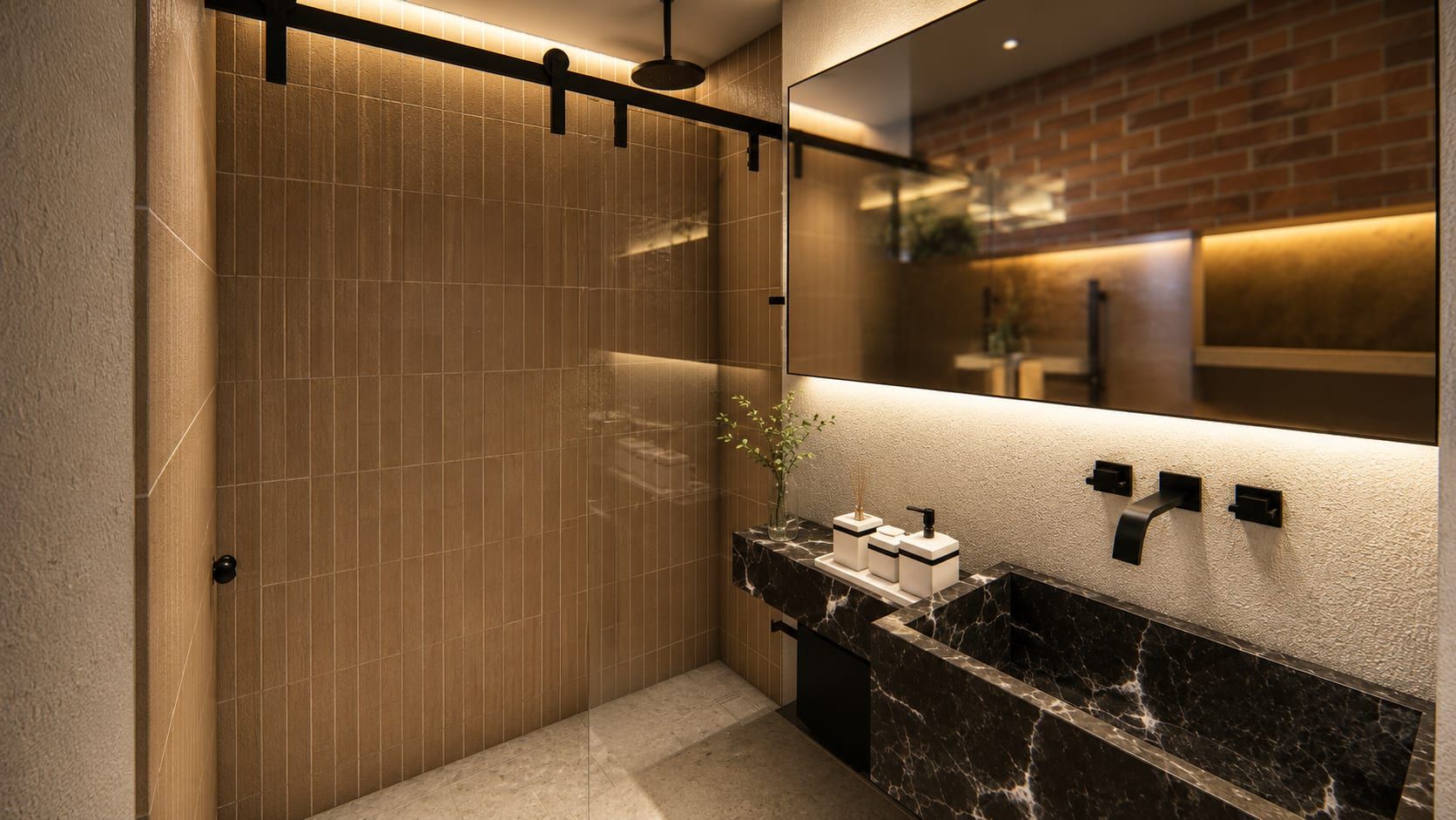 Baño con mesón de mármol oscuro, espejo con luz y muro de ladrillo